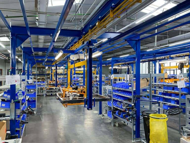 AS-Motor factory, new product line is open: AS 1000 Ovis EVO RC. Wide shot of the assembly line